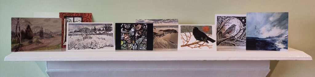 Greetings cards on a mantelpiece